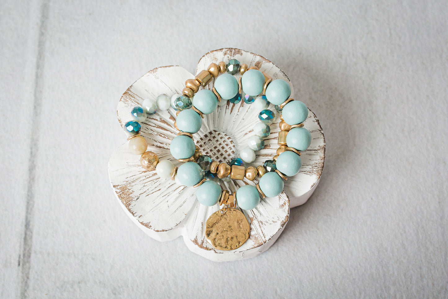 Set of stretch beaded bracelets that can be worn together or alone.